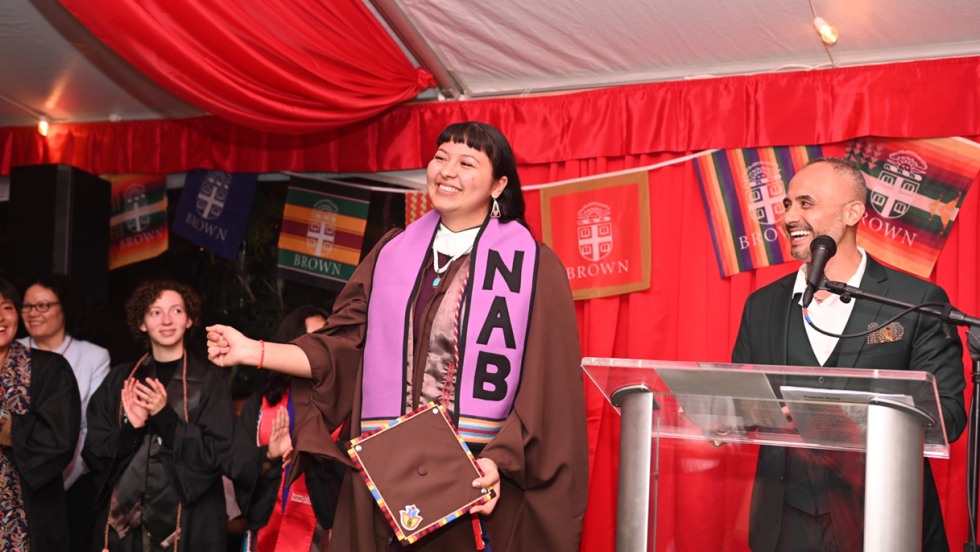 A 2023 graduate receives a Natives at Brown stole during the Unity Celebration 